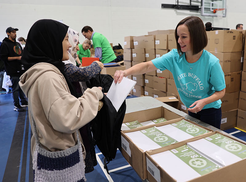 Nutana Machine - Leanne Peddie volunteers for the annual back-to-school backpack giveaway